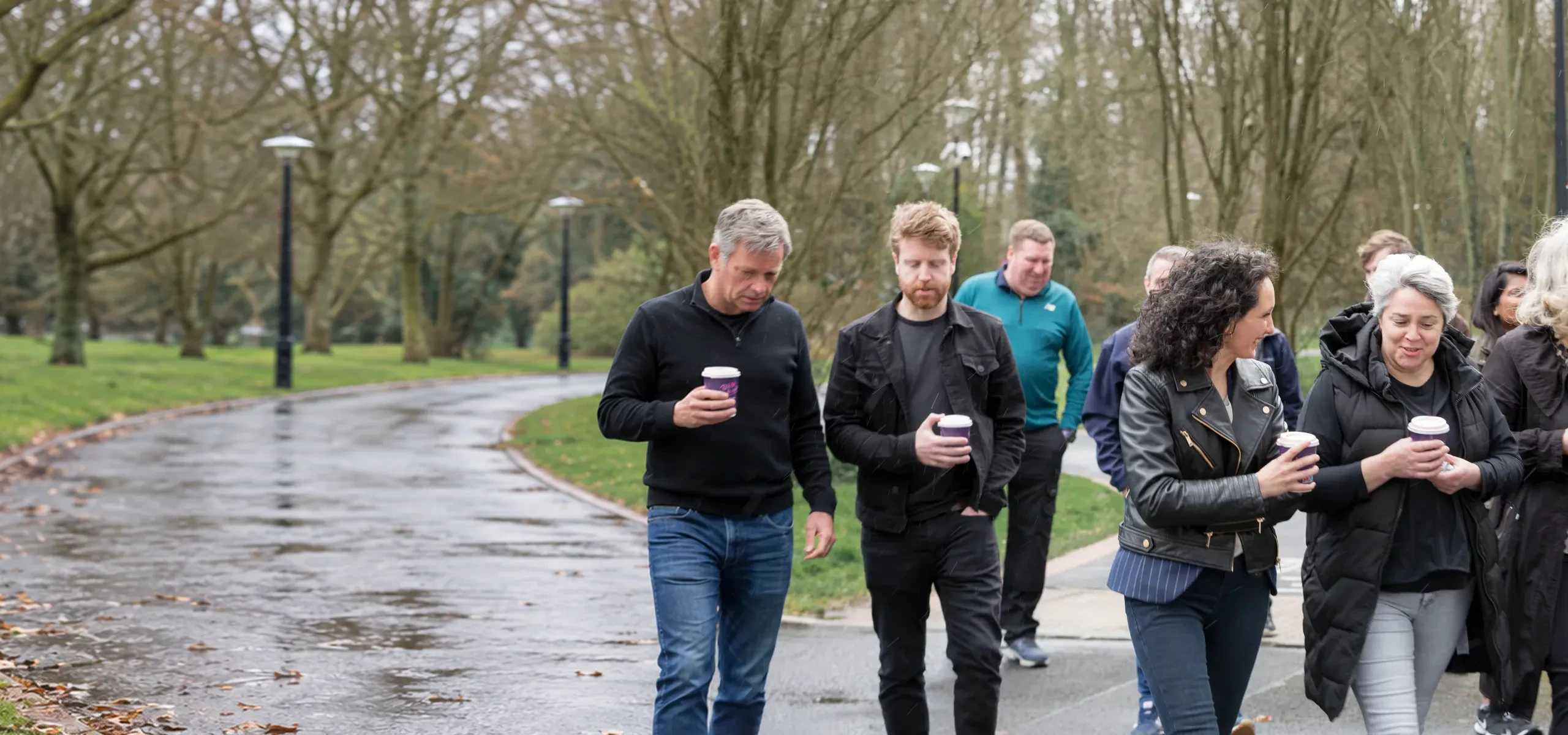 The EpiSensor team walking together on a wet path through a Limerick park.