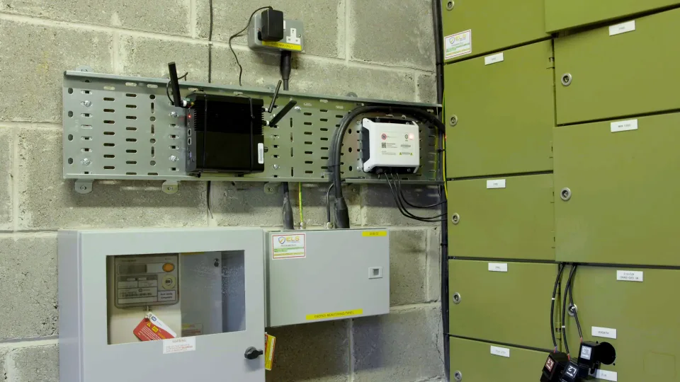 EpiSensor Gateway and electricity monitor installed beside distribution boards