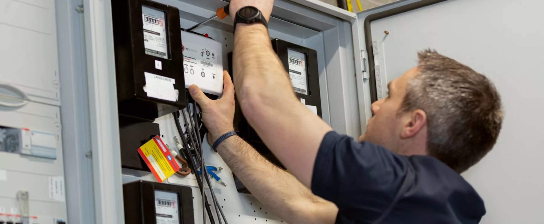 John Ginnane Head of Operations at EpiSensor installing a device